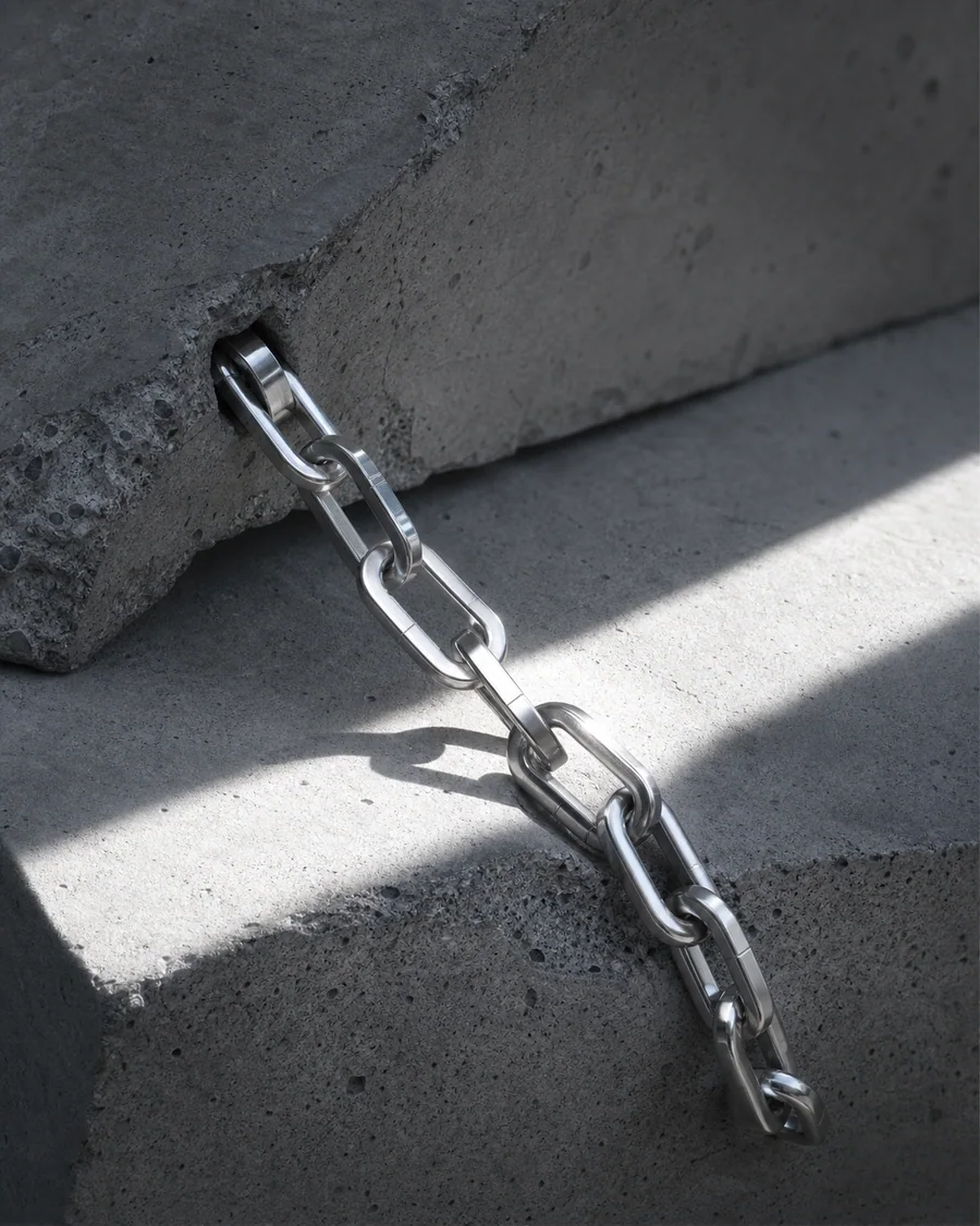 Brutalist chain product photography reference